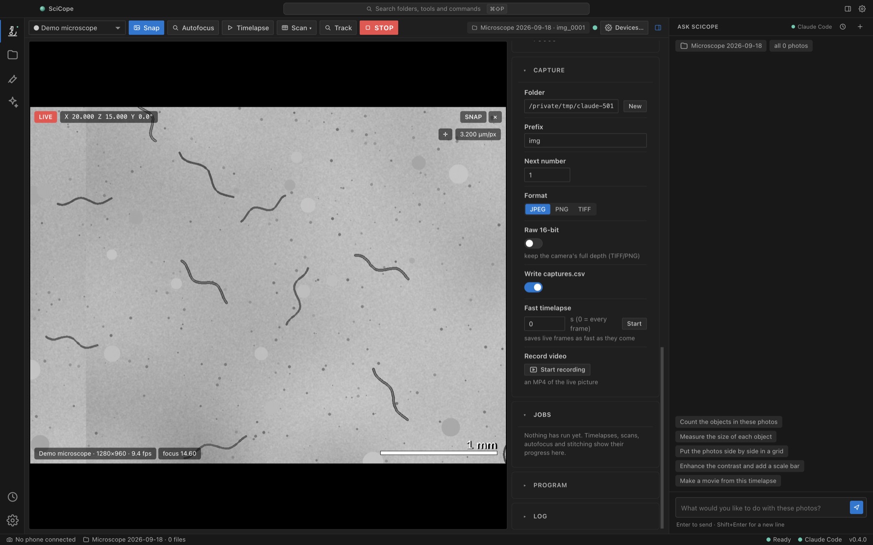 The SciCope desktop app in dark mode: the Microscope view with the live picture of the demo microscope, the camera, stage and light panels on the right and the assistant panel.